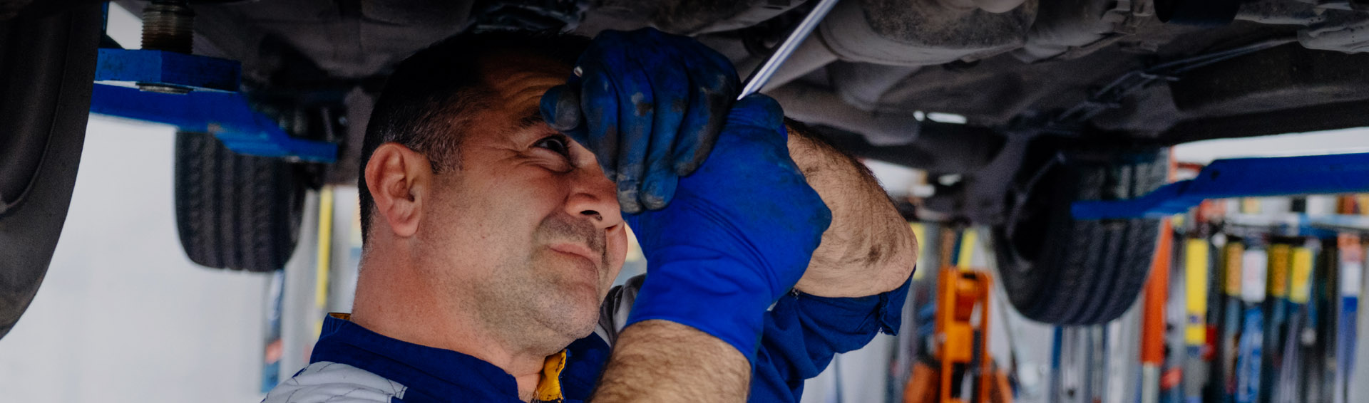 Banner Image used on the Doncaster MOT Website - Shows Car Mechanic at Universal UK MOT Centre Working on a car